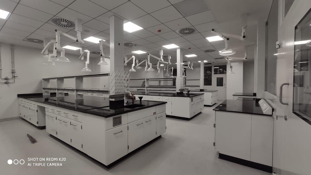 Researchers conducting experiments in a modern lab focused on innovation and technology development